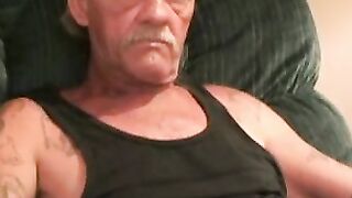 Amateur stud strokes his stiff dick and shoots a load of cum