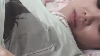 Nubile Oriental minx rubbing pussy before orgasm