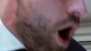 Men in suits enjoy a rough session of steamy sex at work