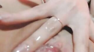 Petite Blonde with Glasses fingering her pussy