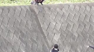 Pervy guy films three Japanese schoolgirls peeing outside