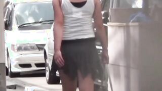 Young Japanese babe peeing on sidewalk with no shame at all