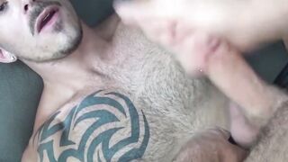 Muscle inked jock doused in jizz after passionate blowjob