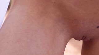 In the forest a nubile is displaying her freshlyshaved pussy