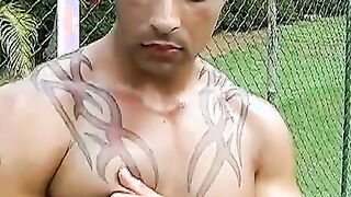 Unusual Brazilian muscle head jerks off on football field solo