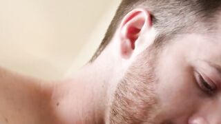 Attractive bearded jock gives head and rides fat dick