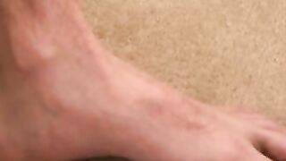 Stud passionately tugs on his huge dick after an interview