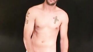 Stud passionately tugs on his huge dick after an interview