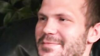 Stud passionately tugs on his huge dick after an interview