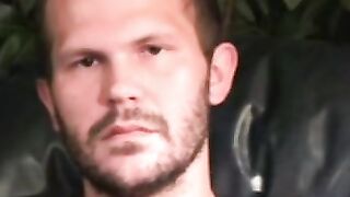 Stud passionately tugs on his huge dick after an interview