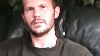 Stud passionately tugs on his huge dick after an interview