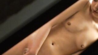 Japanese girl masturbates in the bathroom under voyeurs eye