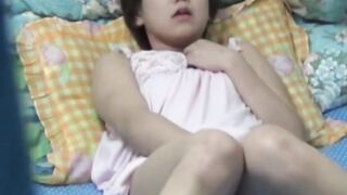 Young horny Japanese girl gets wet and dirty on secret tape