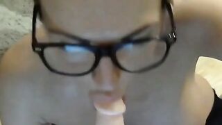 Nerdy MILF sucks and fucks a dildo
