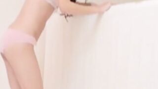 Beautiful Japanese with small boobs peeing in her underwear