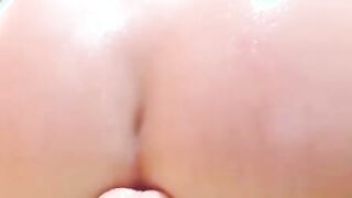 Big Ass babe rides a dildo and loves it