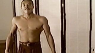 A rockhard cock is flexed by a kooky black stallion