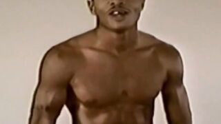 A rockhard cock is flexed by a kooky black stallion