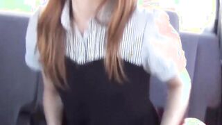 Hot Japanese gal distracts friend and pees next to her in car