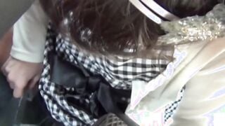 Hot Japanese gal distracts friend and pees next to her in car