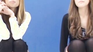 Two voluptuous Japanese girls peeing with their clothes on