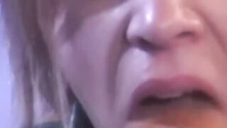 A large lesbian woman gives in to being pounded by her leatherclad mistress