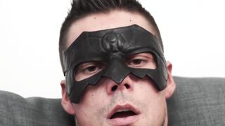 Masked dude spreads his asshole while tugging his huge cock