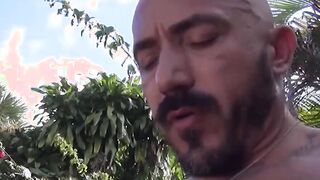 Tattooed stud blows big dick outdoor for huge cum eating