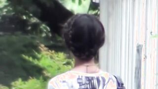 Tantalizing Japanese girl peeing in front of someone bicycle