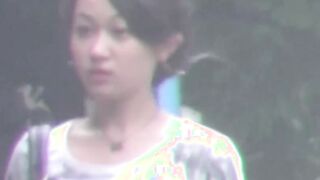 Tantalizing Japanese girl peeing in front of someone bicycle
