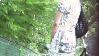 Tantalizing Japanese girl peeing in front of someone bicycle
