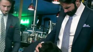 Attractive men in tasteful suits spitroasting pretty base