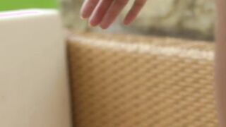 Demi Fray a young brunette beauty is slowmotion pussyteasing