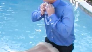 Businessman in a classy suit gets blowjob from gay buff dude