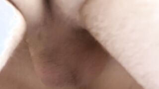 Rubbing and sucking his throbbing dick while he moans loudly