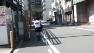 Redhead Japanese with short hair is peeing in the city