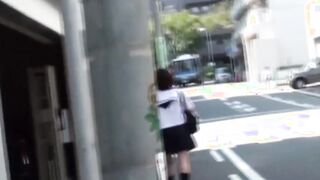 Redhead Japanese with short hair is peeing in the city