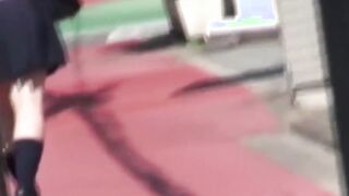 Redhead Japanese with short hair is peeing in the city