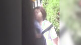 Redhead Japanese with short hair is peeing in the city