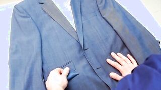 The intern is caught playing with his bosss suit