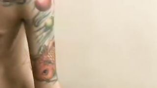 Inked amateur teases with his slim fit body and masturbates