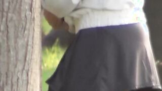 Mesmerizing Japanese girl peeing quickly outside during day
