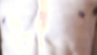 Unmarried Latino straight man soliciting money while baring his back