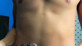 A mischievous twink jerks off his hard dick and dildoes his ass