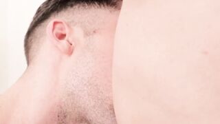 Handsome gay guy strokes his erect cock while ass fucked