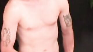 Rough gay shows off his body and big cock while masturbating