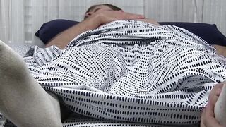 Hunky Sean Holmes masturbates while his buddy sucks his toes