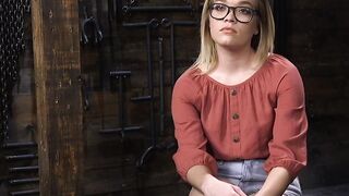 Flexible blonde endures bondage and suspension