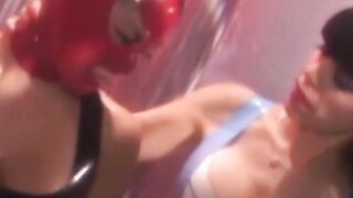 Playing with latex masks and dominatrix lesbian play