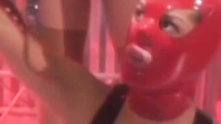 Playing with latex masks and dominatrix lesbian play